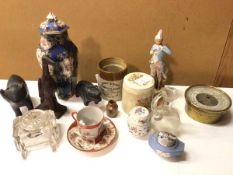 A mixed lot including carved wooden animal figures, Chinese teacup and saucer, a Continental
