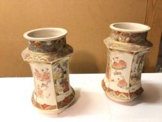 A pair of Satsuma vases of hexagonal form with panels alternating between figures and flowers (a/f),