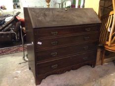 A 19thc mahogany bureau, the fall front enclosing an arrangement of drawers and pigeonholes, above a