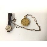 An 18ct gold open faced pocket watch, lacking glass, on yellow metal chain (pocket watch: 4cm) and a