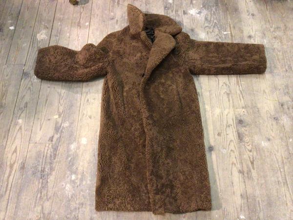 A Swedish fur coat, with a Skandipals label to interior (41cm across shoulders)