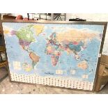 A large Collins 2012 World Map, in metallic frame (106cm x 143cm)