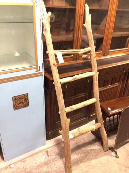 A rustic decorative ladder, with four rungs (176cm x 65cm)