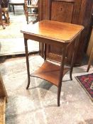 An Edwardian mahogany occasional table, the rectangular top with canted corners and moulded edge