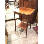 An Edwardian mahogany occasional table, the rectangular top with canted corners and moulded edge