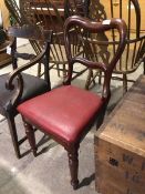 A Victorian balloon back mahogany side chair, with later red upholstery, on turned front supports (