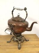 An early 20thc copper and brass kettle on stand (40cm)