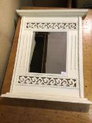 A modern wall mirror with moulded cornice above pierced frieze, with moulded base (83cm x 70cm)