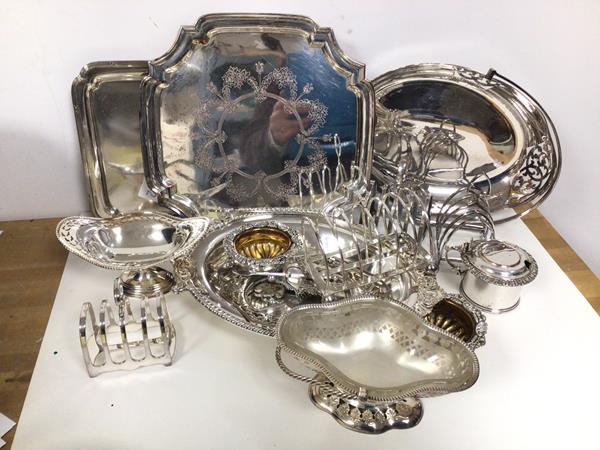 A quantity of Epns including four toastracks, swing handled pierced basket, bonbon dish, salvers