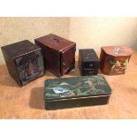 A group of Japanese decorated boxes, including a Carr & Co. tin biscuit box with bird before Mount