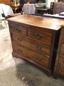 An Edwardian mahogany chest of drawers, the rectangular top above two short and two long drawers, on