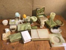 A collection of mainly onyx boxes and trinket dishes including hinged boxes, vases, figures, soap