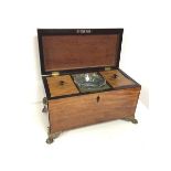 A Regency mahogany tea caddy, the interior with original tea cannister lids (lacking lead liners and