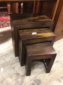 A set of three modern hardwood nesting tables with rectangular tops and slatted sides (largest: 46cm