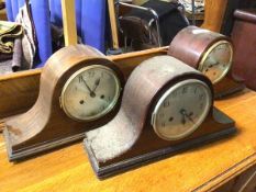 A group of three first half of 20thc tambour style mantel clocks, all with arabic numerals (23cm x