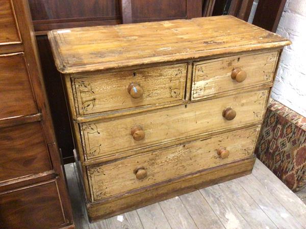 A Victorian pine chest of drawers with grained and painted distressed finish, the rectangular