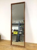 A wall mirror with teak frame and metal edge (95cm x 33cm)