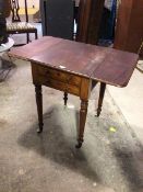 A Victorian mahogany work table, the top with two drop leaves to sides, with moulded edge above