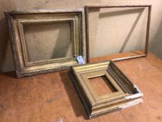 A group of three moulded gilt frames (largest internal: 25cm x 19cm)
