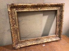 An Edwardian picture frame with gilt moulded edge (internal: 39cm x 56cm)