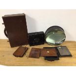 A C.F. Goerz glass plate negative camera with additional slides, one marked Morgan and Kidd,