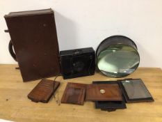 A C.F. Goerz glass plate negative camera with additional slides, one marked Morgan and Kidd,