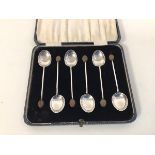 A boxed set of six 1920s Birmingham silver coffee bean spoons