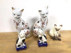 A mixed lot of cat figures including two John Jenkins (21cm), a Royal Worcester Siamese and two