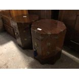 A pair of Chinese octagonal lamp tables, each with two hinged doors to side, opening to recess, on