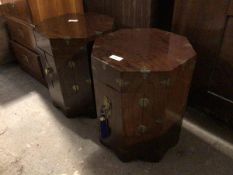 A pair of Chinese octagonal lamp tables, each with two hinged doors to side, opening to recess, on