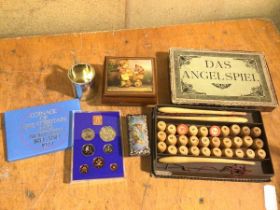 A mixed lot including a Das Angelspiel vintage children's game, lacking one rod, a Coinage of