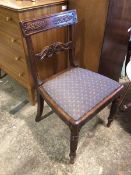 A mahogany Regency side chair, the tablet top and back rail with foliate decoration, above a drop in