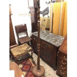 A William IV style floor lamp with turned stem on circular dished base (176cm)