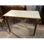 A kitchen table with faux marble laminate top on plywood supports (77cm x 116cm x 61cm)