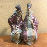A Lladro figure of Two Noblemen in Conversation (30cm)
