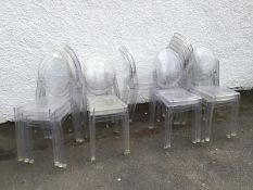 A set of nineteen Philippe Stark Ghost chairs (each: 90cm x 38cm x 41cm)