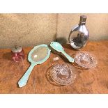 A mixed lot including two cut glass candleholders, a mid 20thc hand mirror and matching hairbrush, a