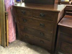 An Edwardian mahogany chest of drawers with two drawers above three long drawers, on bracket feet (