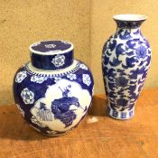 A modern Chinese blue and white vase of baluster form (31cm) and a Chinese ginger jar with two