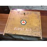 A vintage First Aid cabinet, inscribed Sanoid, with fall front enclosing a fitted interior, on