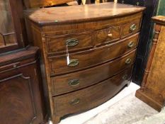 A 19thc bow front mahogany chest of drawers, with three short drawers above three graduated drawers,