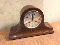 An Edwardian mahogany tambour style mantel clock with arabic numeral dial (27cm x 43cm x 15cm)