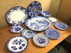 A mixed lot of mainly blue and white china including a Willow pattern ashet, Italian pattern plates,