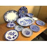 A mixed lot of mainly blue and white china including a Willow pattern ashet, Italian pattern plates,