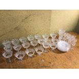 Assorted glassware including eleven sorbet glasses (8cm x 10cm), twelve champagne coupes, plates,