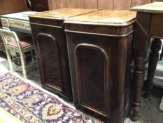 A pair of Victorian walnut veneered cabinets, possibly adapted from dressing table, both with