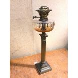 An Edwardian oil lamp, the cut glass reservoir on a Corinthian column body, stamped Evereds (54cm)