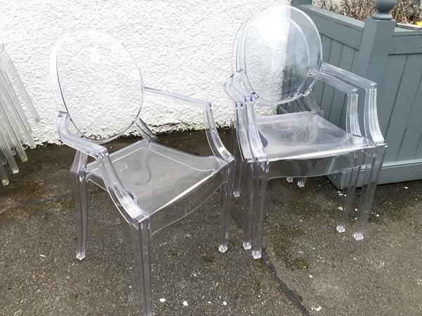 A set of three Philippe Stark Ghost armchairs (93cm x 55cm x 45cm)