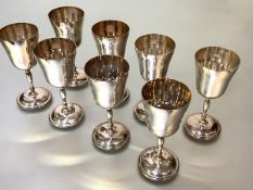 A cased set of eight silver goblets, Charles S. Green & Co. Ltd, Birmingham 1982, each with shaped