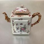 A Chinese Export porcelain teapot, of oblong form, each side with raised panel, decorated in a